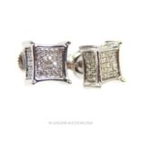 A pair of 14 ct white gold, square-shaped, pave diamond, stud earrings