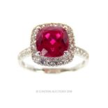 A 14 ct white gold, ruby and white sapphire cluster ring