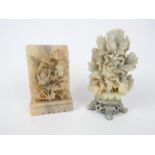 Two large floral spray, soapstone carvings; largest 22cm high.