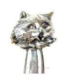 A sterling silver bookmark with a cat's face finial
