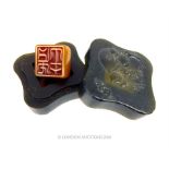 A Chinese amber coloured soapstone seal