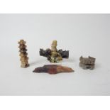 Four small soapstone carvings including a Pagoda tower (8cm high) and a censer.