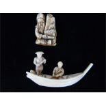 An antique, Japanese netsuke and a Chinese, ivory boat carving