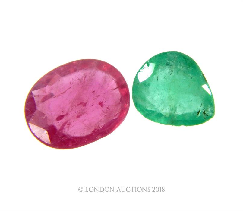 A ruby and emerald; both loose stones.