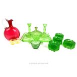 A collection of coloured glass including some green glass, dressing table pieces; cranberry glass