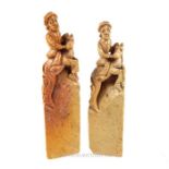 A pair of carved soapstone seals