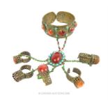 A Bedouin-style cuff and attached finger rings studded with agate cabochons