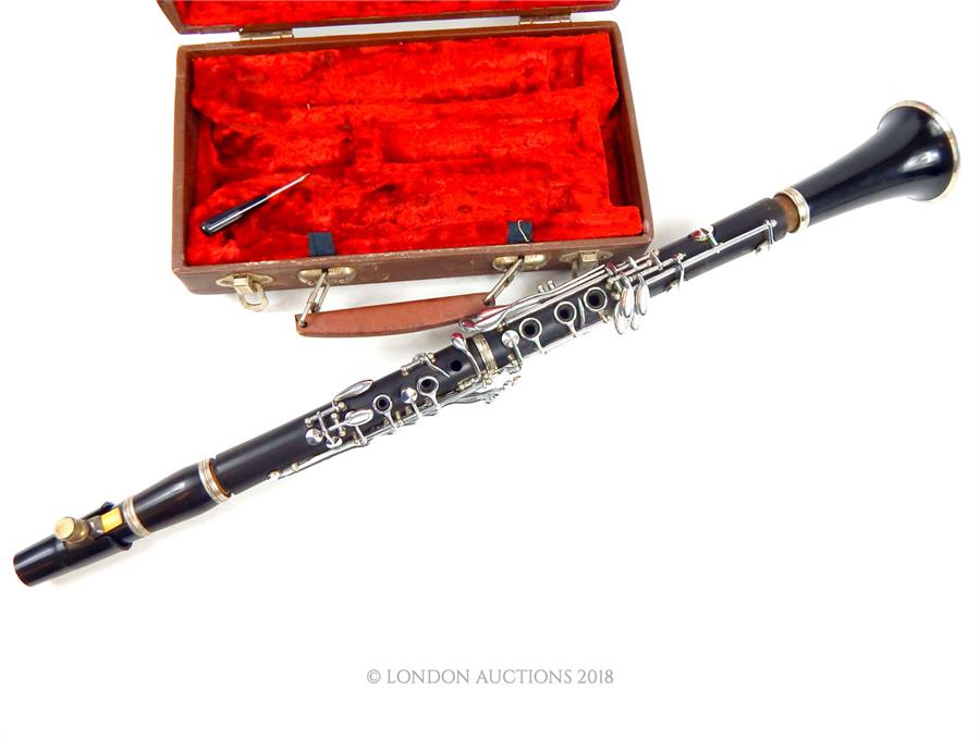 A modern, clarinet with fitted case made in Leningrad, Russia.