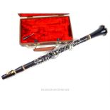 A modern, clarinet with fitted case made in Leningrad, Russia.