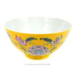 A Chinese, porcelain, hand-enamelled, famille jaune, footed bowl