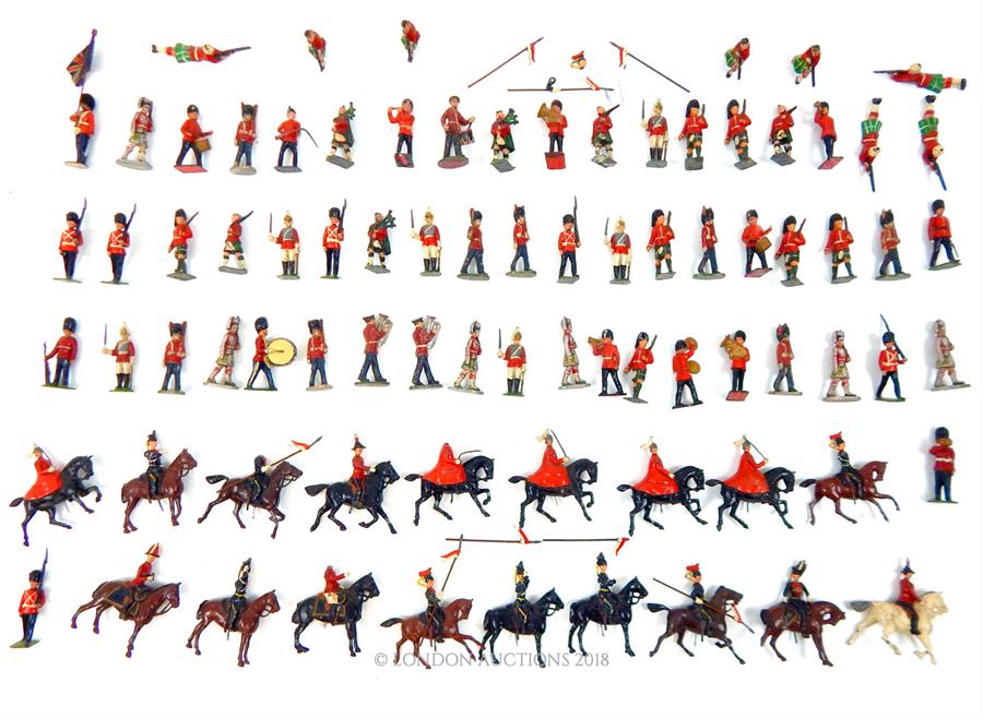 A collection of over 60 vintage Britains and uknown manufactured die-cast lead toy soldiers