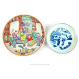 A Chinese, famille rose dish and a blue and white example