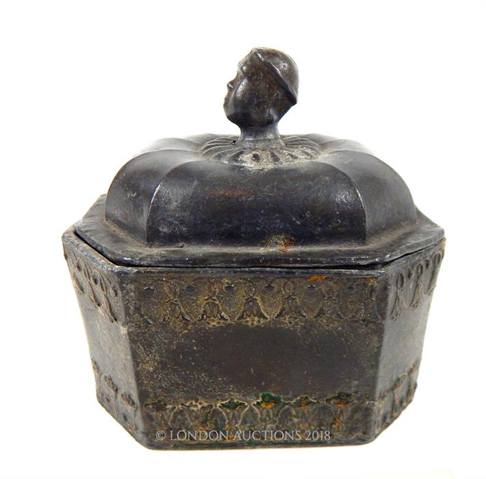 An Antique small lead casket, possibly middle-eastern with Nubian style bust to it lid; 12cm long. - Image 2 of 2