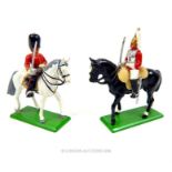 Two die-cast metal Britains model mounted British army cavalry on parade; both without boxes.