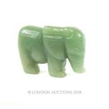 A Chinese, carved, green jade, elephant