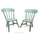 Two early 20th century, children's chairs in a distressed pale blue finish.