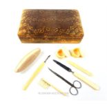 A 1930's, snake-skin boxed, complete, bone-handled vanity set