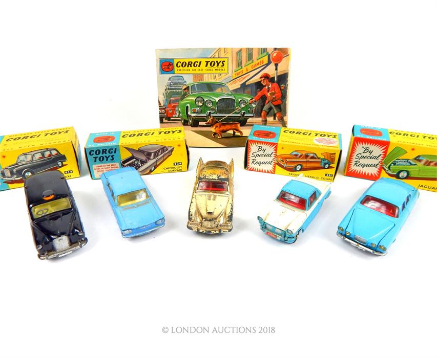 Five Corgi Toys, four with original boxes: a Jaguar Mark X 238; a two tone, Triumph Herald Coupe