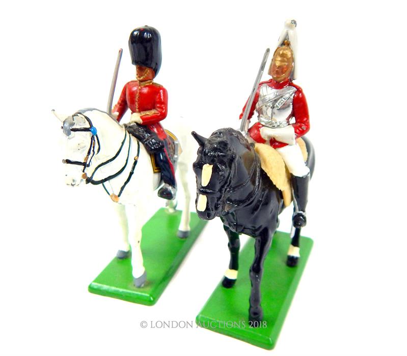 Two die-cast metal Britains model mounted British army cavalry on parade; both without boxes. - Image 2 of 2