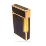 A Dupont rose gold plated and brown lacquered lighter