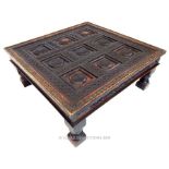 A large, Afghan, intricately-carved, hardwood, coffee table