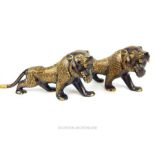 A pair of large, weighty, Eastern, bronze lions