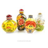 A collection of four, hand-painted, Chinese snuff bottles