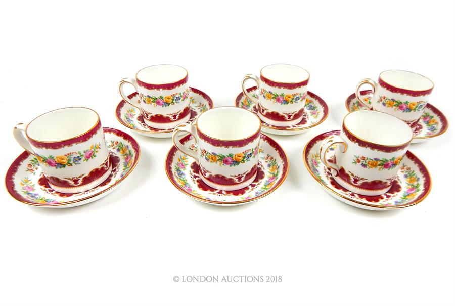 Six Crown Staffordshire Pink Tunis style pattern coffee cans and saucers.