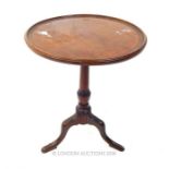 A mahogany wine table