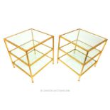 A pair of side tables, with under shelving also featuring glass tops and gilt metal frames; 45cm