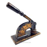A late 19th century, cast iron and hand-painted, embossing machine