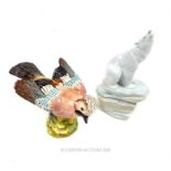 A large, Lladro Polar bear figurine and a large, Beswick bird figurine