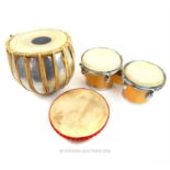 A Bina Indian drum together with a pair of bongo drums (a/f) and an ethnic style tambourine.