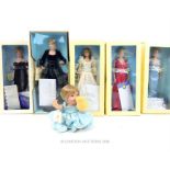 A collection of eight Franklin Mint dolls of Diana Princess of wales, including a Wedding dress