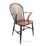 A 19th century hoop back Windsor open armchair