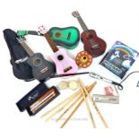 Four Ukuleles (including a Tiger with gig bag) and an various other accompanying instruments: