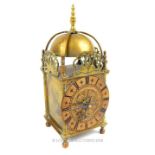 A late 19th century, brass cased clock