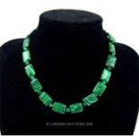 A sterling silver clasped and malachite, beaded necklace