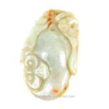 A Chinese, carved, green jade, gourd pendant