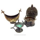 Three eastern metal wares: a Kashkul, boat style bowl with lacquer floral design; a small oil lamp