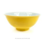 A Chinese, porcelain, famille jaune, Qing style, footed bowl