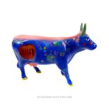 A 2002, colourful, cow figurine by CowParade Holdings Corporation