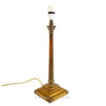 A decorative, weighty, brass, Corinthian column table lamp