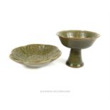 A Chinese, incised, celadon dish and stem cup