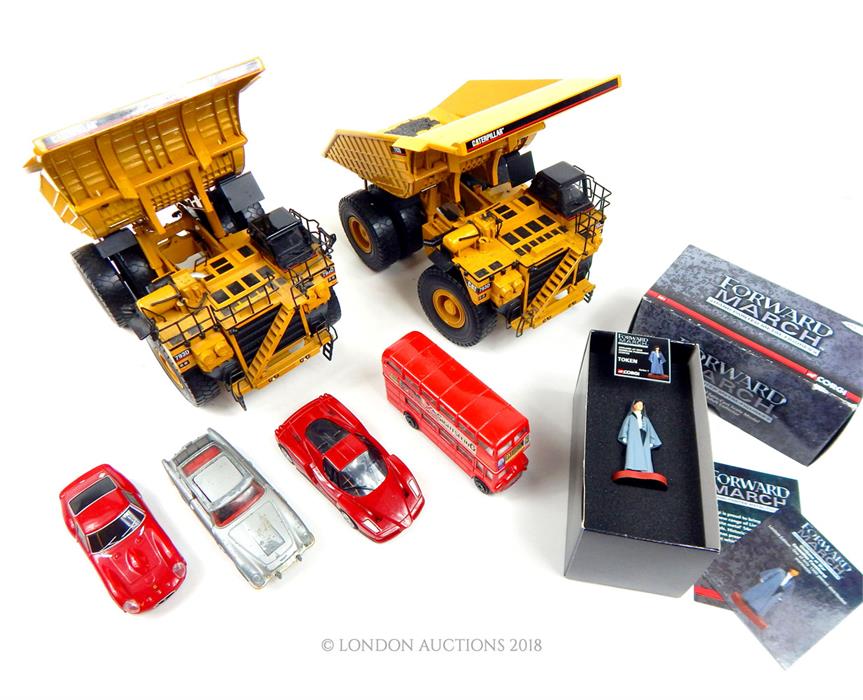 A Corgi 007, Aston Martin (a/f) without its box and passenger together with a Corgi "Forward