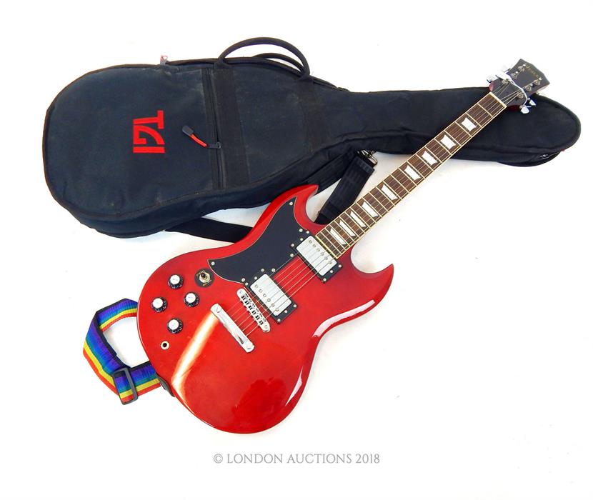 A left handed "Westley" SG style electric guitar in red with black scratch plate; rosewood