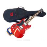 A left handed "Westley" SG style electric guitar in red with black scratch plate; rosewood