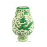 A Chinese, Ming-style, vase decorated with a green dragon and phoenix