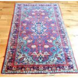 An antique Sarouk Farghan rug