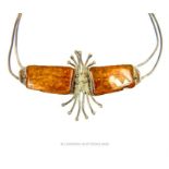 A sterling silver and amber, abstract necklace